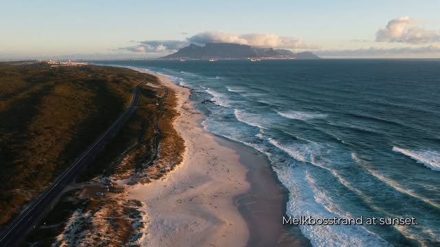 Aerial view of the Melkbosstrand coastline with Table Mountain behind
